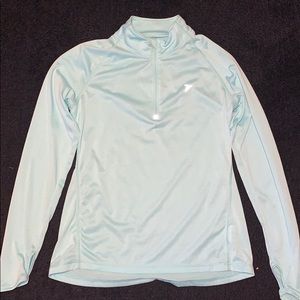 Light blue running top